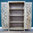 Large Wooden Storage Unit With Shelves And Doors